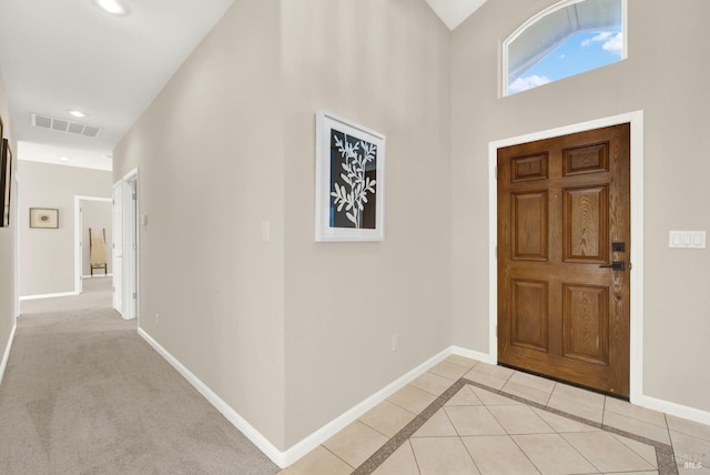 view of tiled foyer entrance