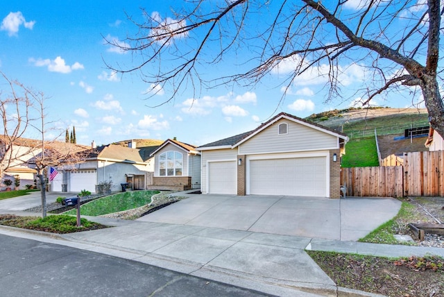 ranch-style house featuring a garage