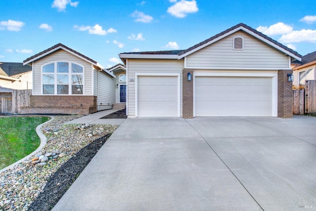 ranch-style house featuring a garage