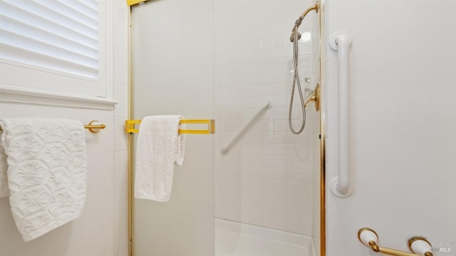 bathroom featuring an enclosed shower