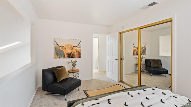 carpeted bedroom with a closet