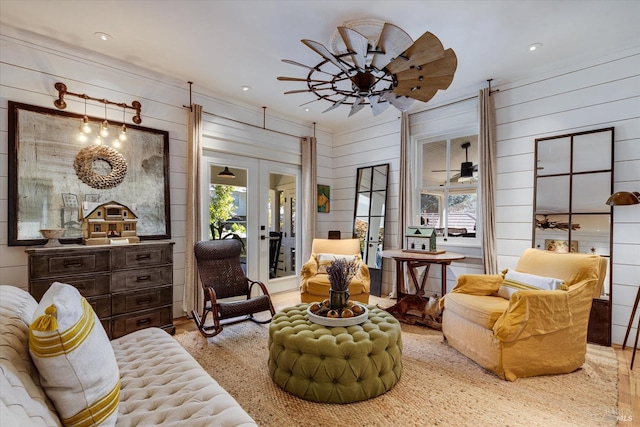 living area with recessed lighting, french doors, plenty of natural light, and ceiling fan