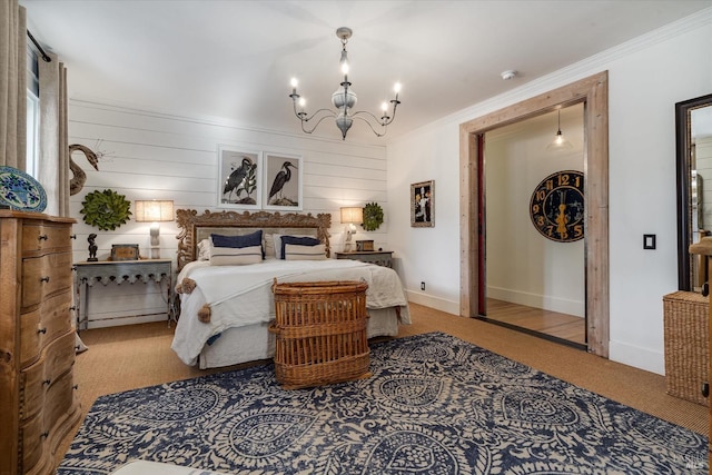 bedroom with ornamental molding, baseboards, and an inviting chandelier