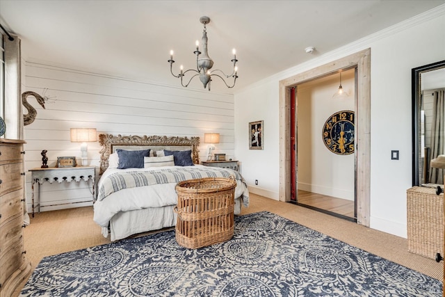 bedroom featuring carpet floors, baseboards, ornamental molding, and a notable chandelier