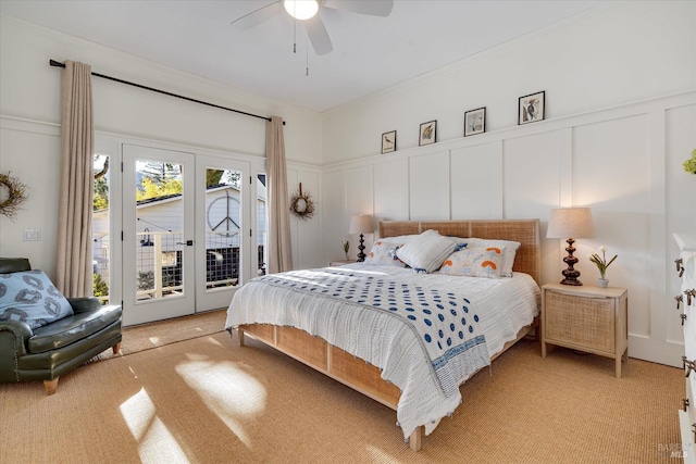 carpeted bedroom featuring access to exterior, french doors, and ceiling fan