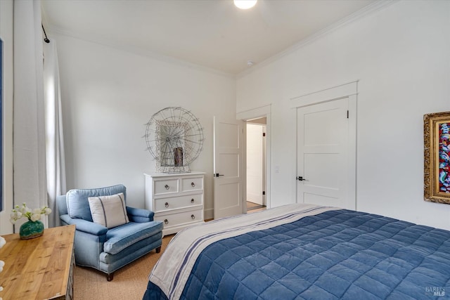 carpeted bedroom with ornamental molding