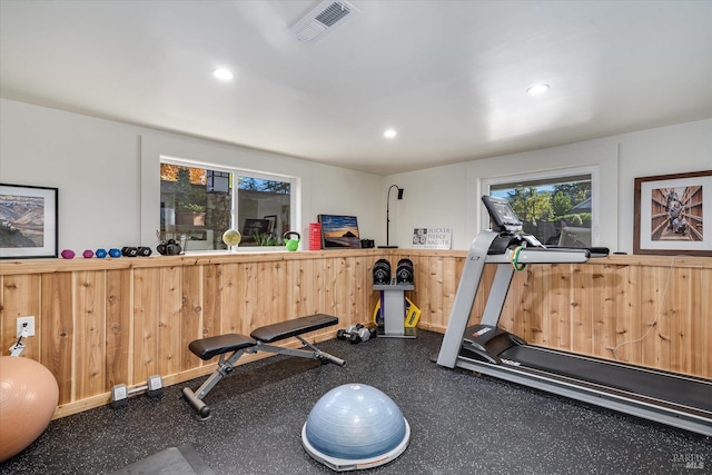 workout area featuring visible vents and recessed lighting