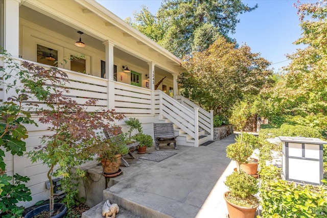 view of side of property with stairs