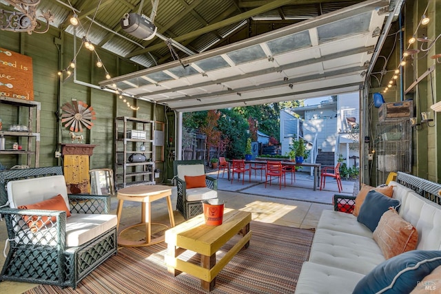 interior space featuring outdoor dining space and an outdoor living space