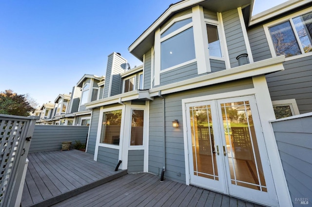 wooden terrace featuring french doors