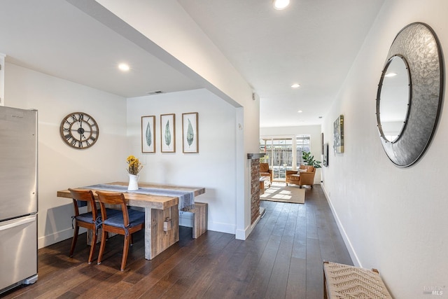 dining room featuring dark hardwood / wood-style flooring