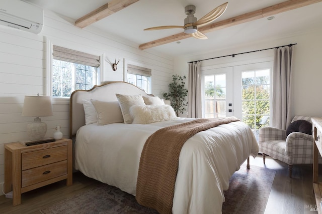 bedroom featuring ceiling fan, beamed ceiling, dark hardwood / wood-style floors, an AC wall unit, and access to outside