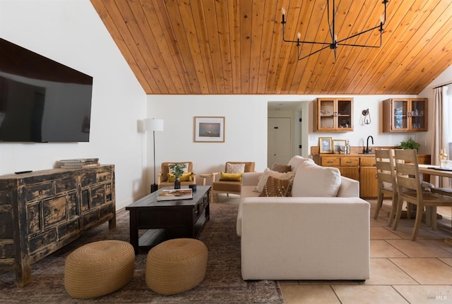 tiled living room with a chandelier, wooden ceiling, and vaulted ceiling