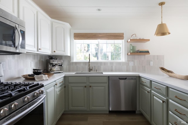 kitchen with gray cabinetry, backsplash, sink, white cabinetry, and stainless steel appliances