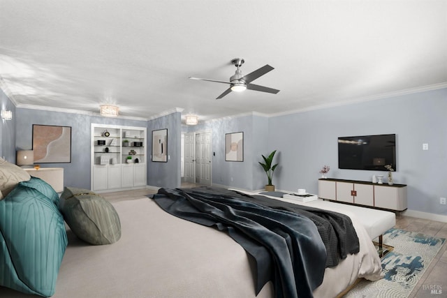 bedroom featuring ceiling fan and crown molding