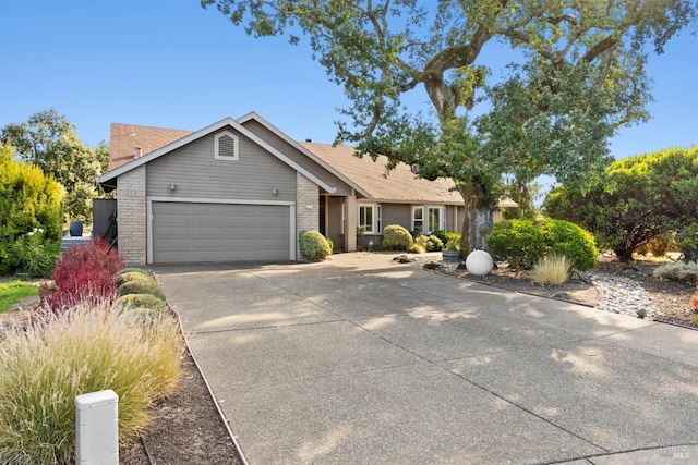 ranch-style home with a garage