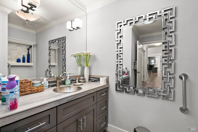 bathroom featuring vanity and ornamental molding