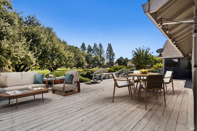 wooden deck featuring an outdoor hangout area