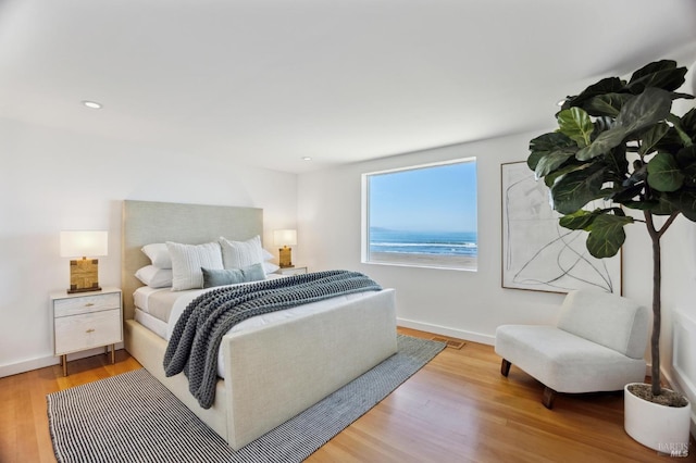 bedroom featuring light hardwood / wood-style floors