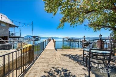 surrounding community featuring a water view