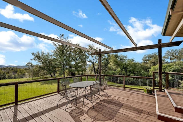 wooden terrace with a pergola