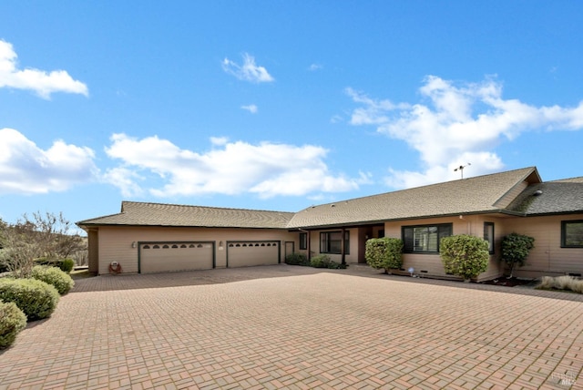 ranch-style home with a garage