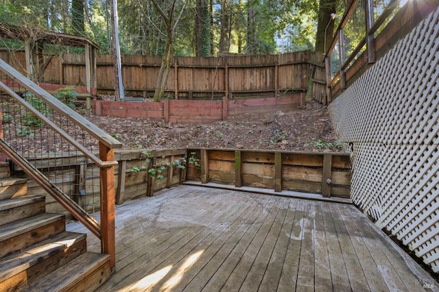 wooden deck with stairs and fence