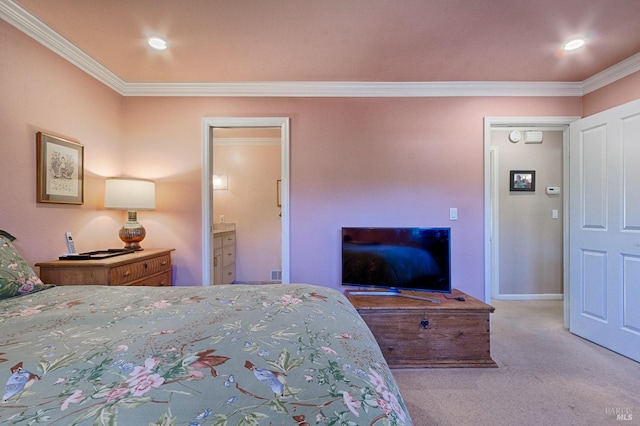 bedroom featuring recessed lighting, light colored carpet, ornamental molding, ensuite bath, and baseboards