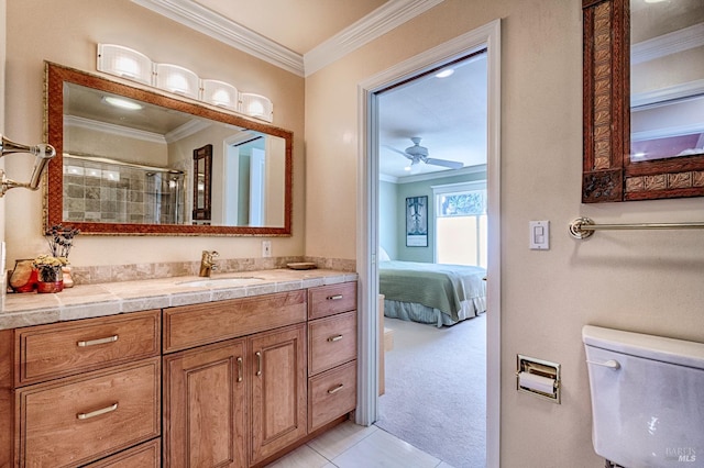 full bathroom featuring connected bathroom, a shower with shower door, vanity, a ceiling fan, and ornamental molding