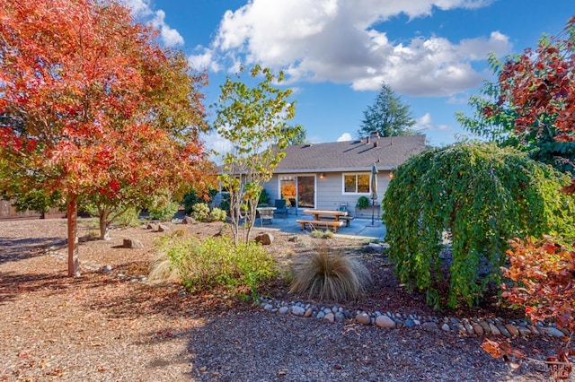 back of property featuring a patio area