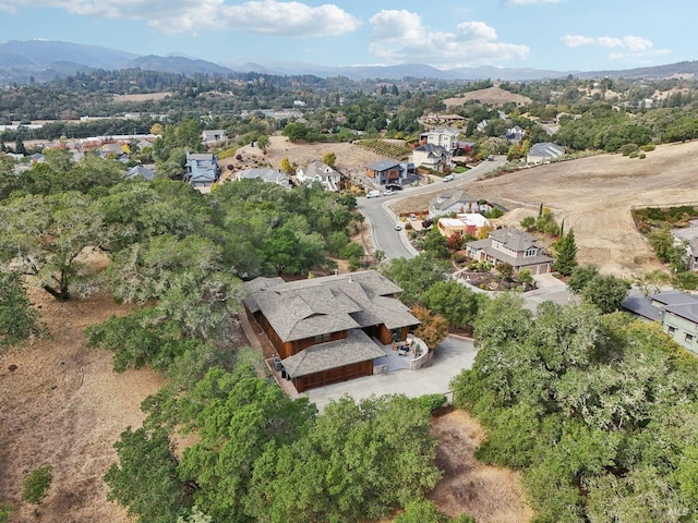 bird's eye view with a residential view and a mountain view