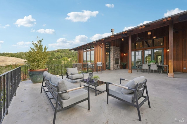 view of patio / terrace with french doors and an outdoor living space