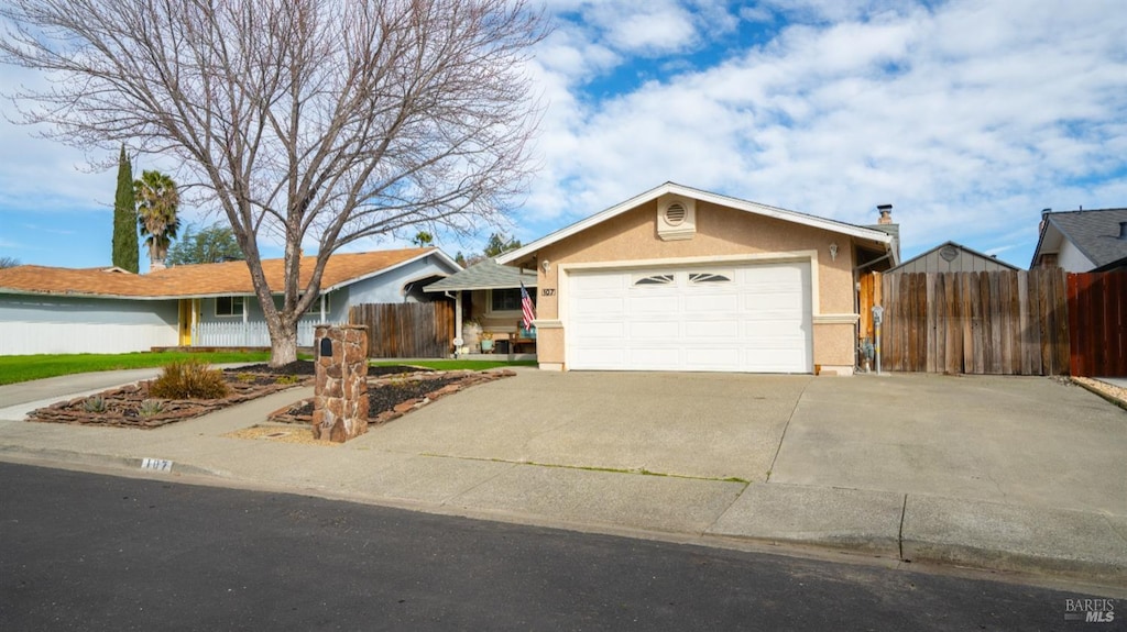 single story home with a garage