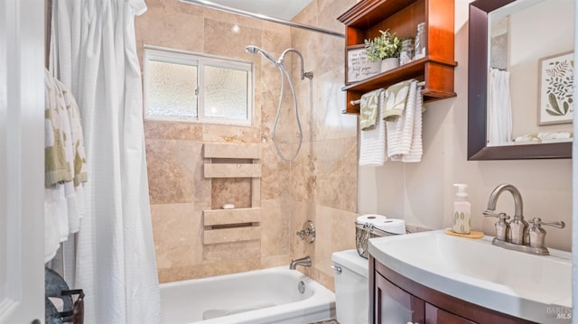 full bathroom with shower / bathtub combination with curtain, vanity, and toilet