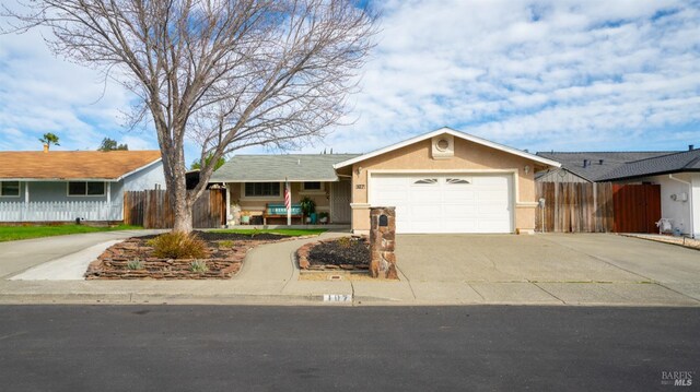 ranch-style home with a garage