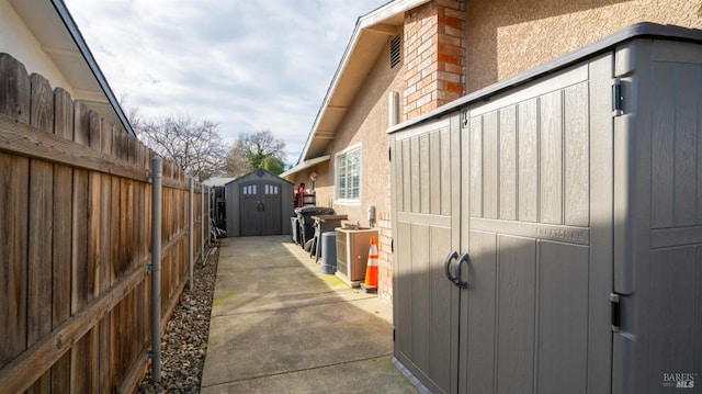 view of home's exterior featuring a shed