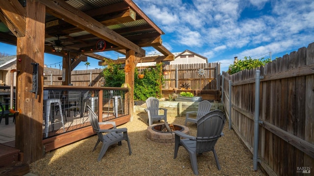 view of patio with an outdoor fire pit