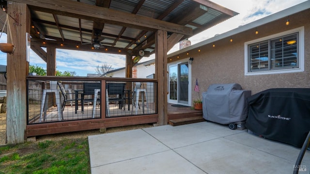 exterior space featuring a patio area, ceiling fan, and grilling area