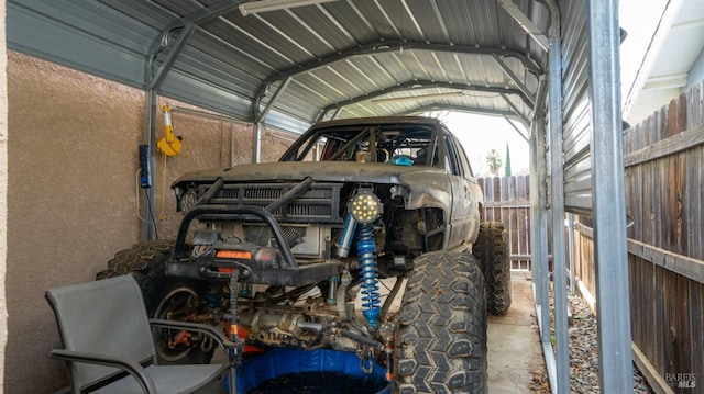 garage featuring a carport