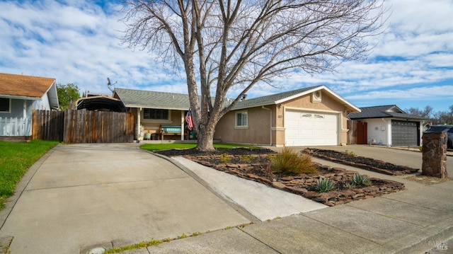 ranch-style house featuring a garage