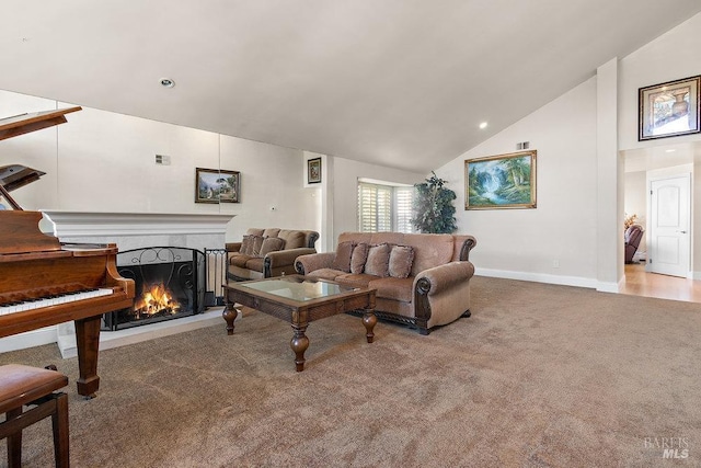 living room with carpet and lofted ceiling