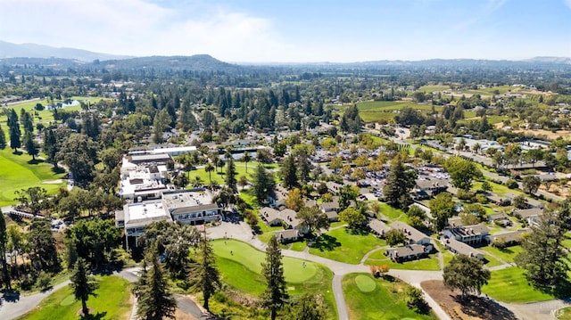 drone / aerial view featuring a mountain view and golf course view