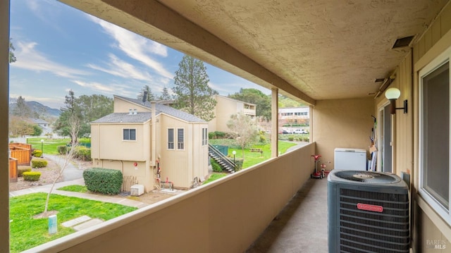 balcony featuring cooling unit
