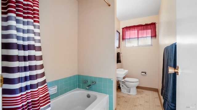 bathroom featuring plus walk in shower and toilet