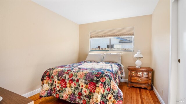 bedroom featuring hardwood / wood-style flooring