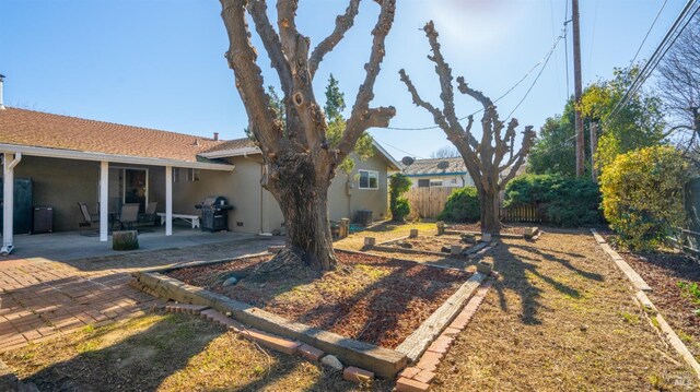 exterior space with a patio area