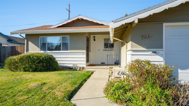 bungalow with a front lawn