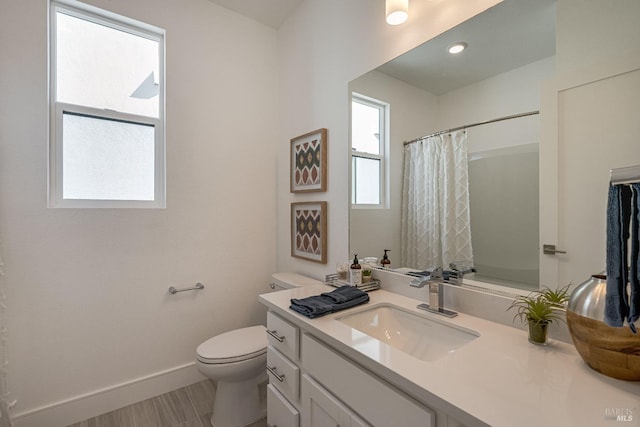 bathroom with a shower with shower curtain, vanity, toilet, and wood-type flooring