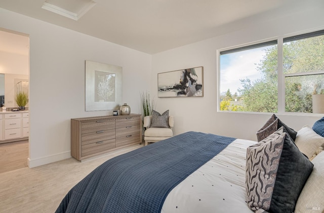 bedroom featuring ensuite bath