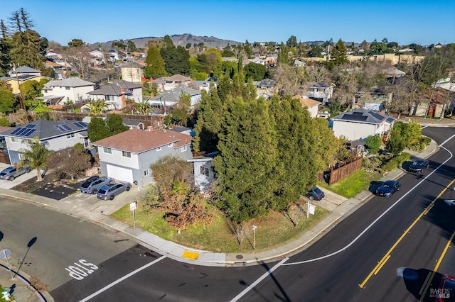 bird's eye view with a residential view and a mountain view